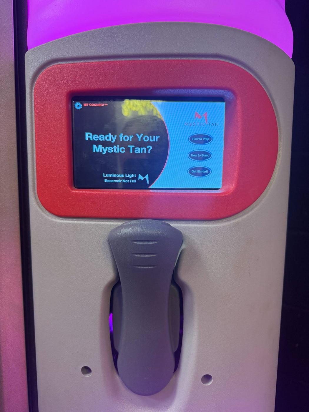 Mystic Tan spray booth controls at Luxe Glow Studio Rotherham